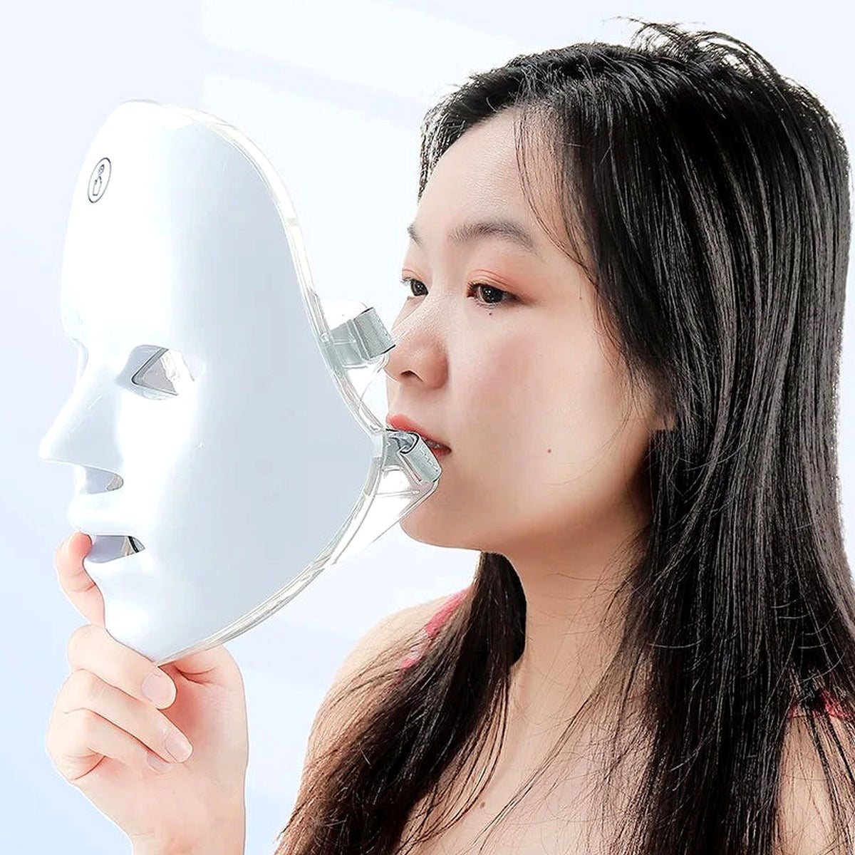 Sparkle Ritual LED Glow Mask — worn, soft white finish